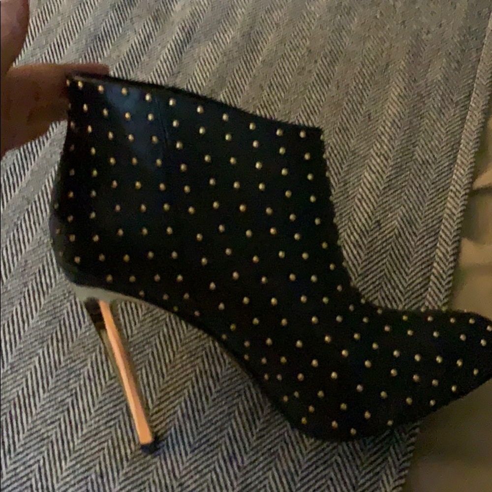 Black shoes with gold dots